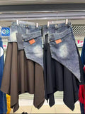 Brown and black flowing skirts with asymmetric washed-blue denim-look panels