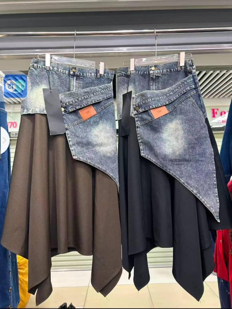 Brown and black flowing skirts with asymmetric washed-blue denim-look panels